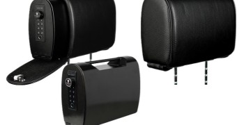 A pair of black speakers with a remote control.