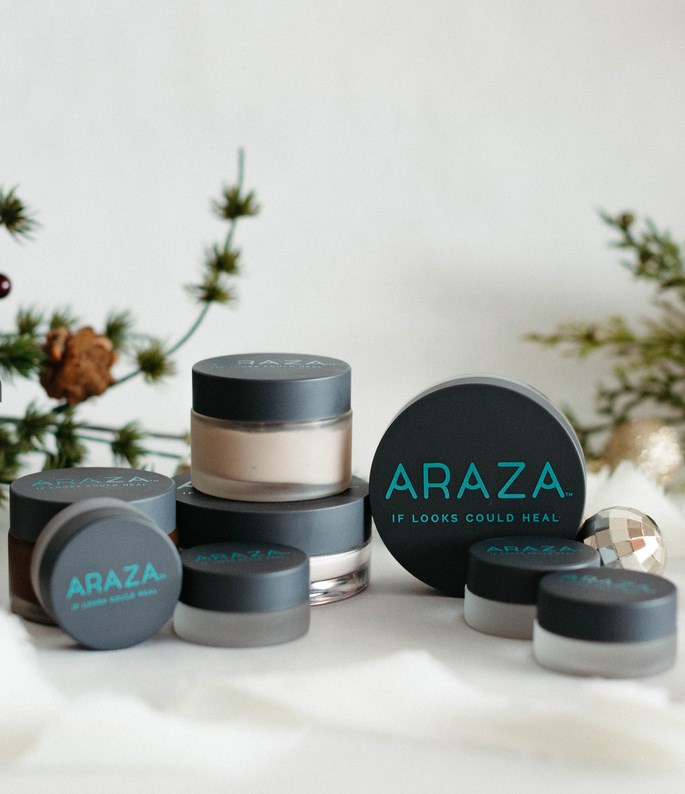 Arazza's holiday collection is shown on a white table.