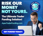 A man in glasses expresses excitement in front of his laptop with an advertisement about trader funding solutions on the screen.